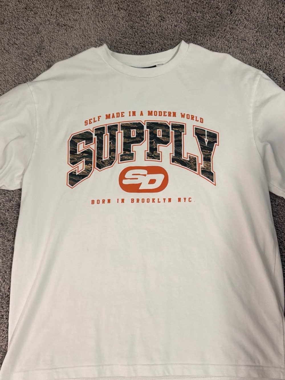 SUPPLY White Short-Sleeve Graphic Tee with Orange Accents